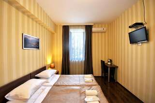 Отель Athletics Hotel Тбилиси Стандартный двухместный номер с 1 кроватью или 2 отдельными кроватями-4